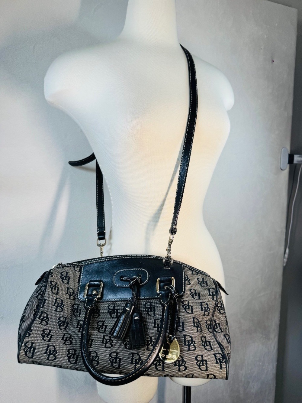 Dooney & Bourke Black and Beige Logo Domed Tassel Satchel Barrel bag